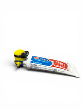 Load image into Gallery viewer, Minions Pooping Toothpaste Topper | Comes with Toothpaste | Minions Bathroom Gag Gift for Kids and Adults