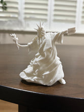 Load image into Gallery viewer, This is a statue of Lady Liberty throwing her torch in protest for peace. This art piece is known as the Riot of Liberty.
