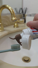 Load and play video in Gallery viewer, Dog pooping toothpaste topper
